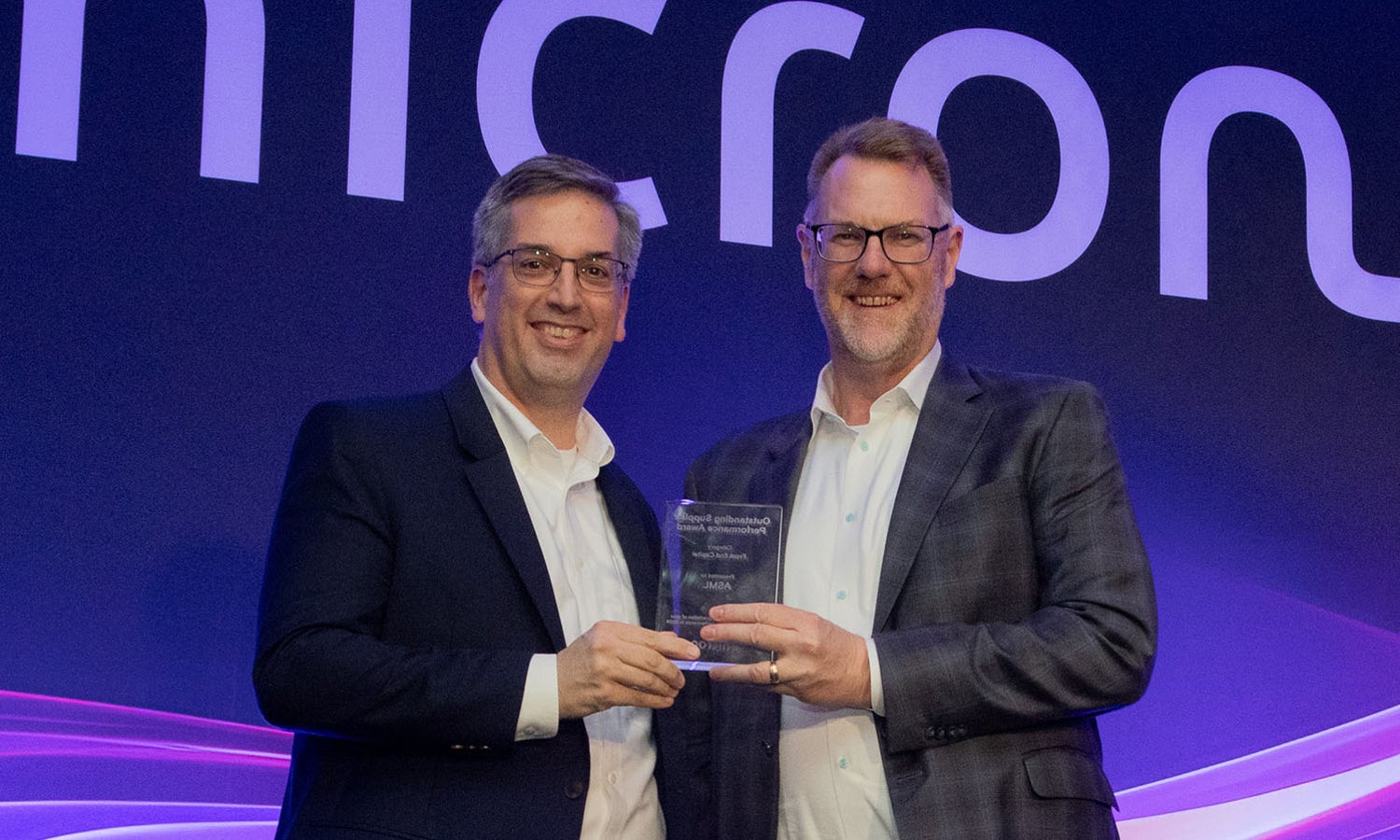Scott DeBoer presenting the award to Jim Koonmen