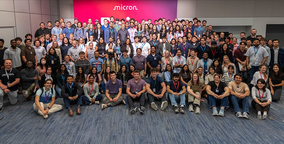 A group of interns posing for a photo