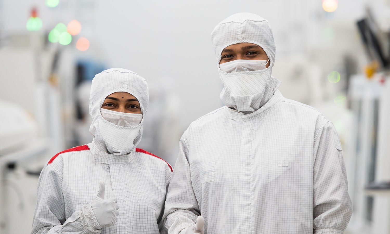 Fab workers in bunny suits