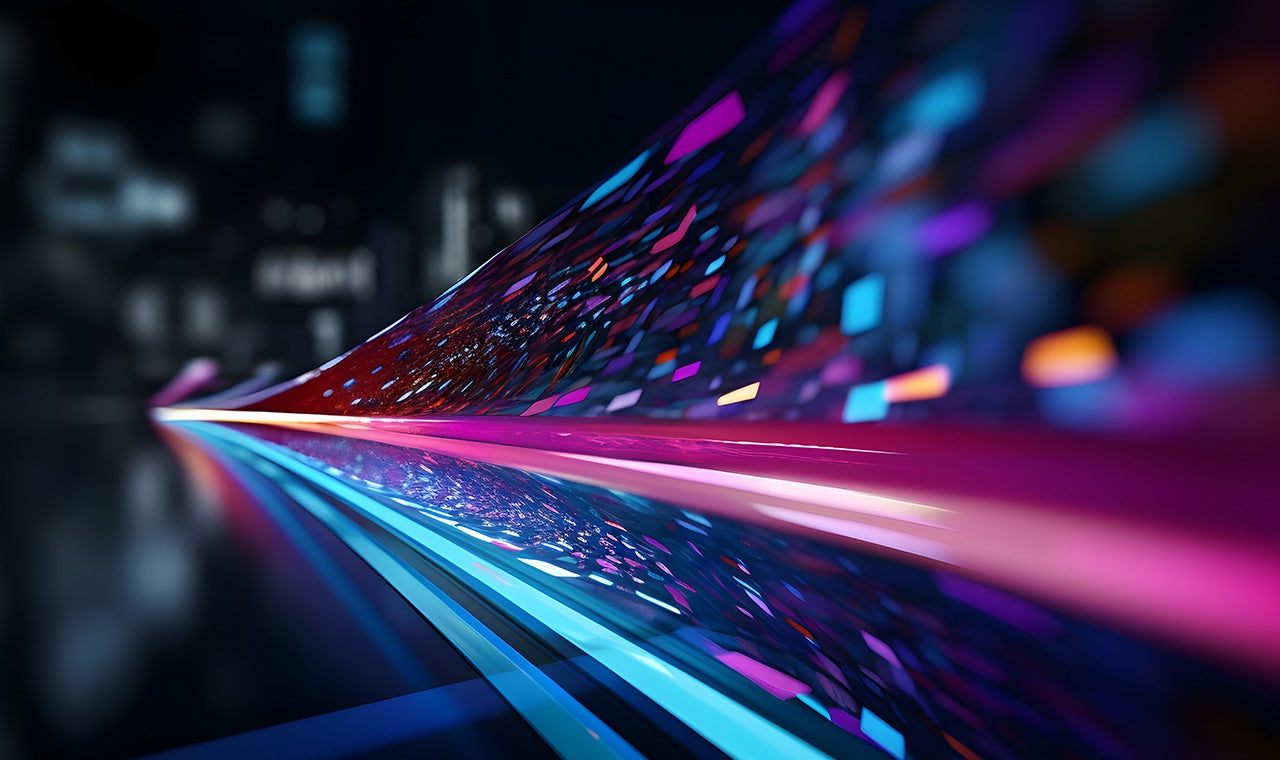 Abstract neon light streaks moving through a dark, futuristic space