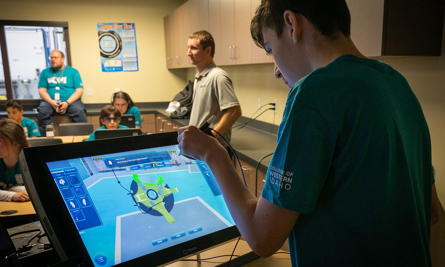 Student working on touchscreen in classroom setting