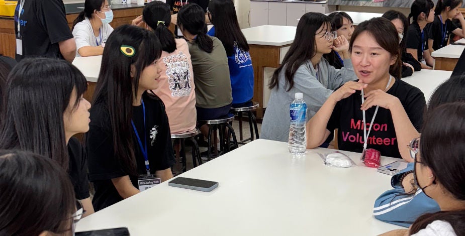 Micron Gives volunteers teaching attendees at an event.