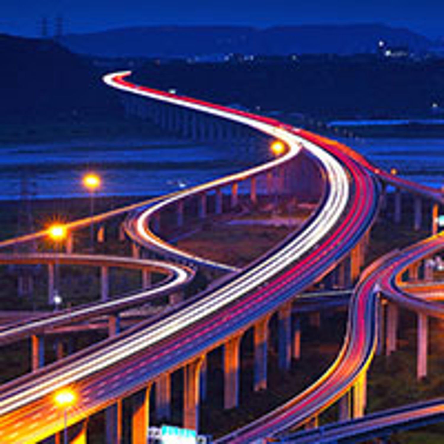 Multiple highways looping around with lights