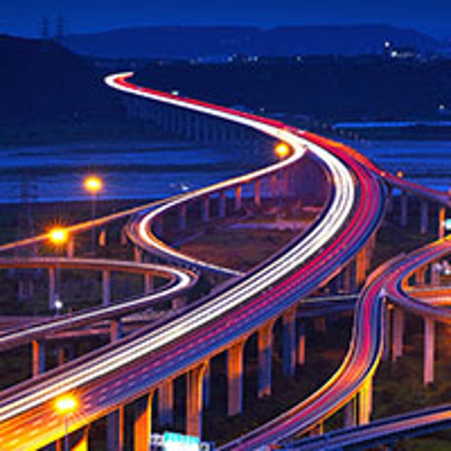 Multiple highways looping around with lights
