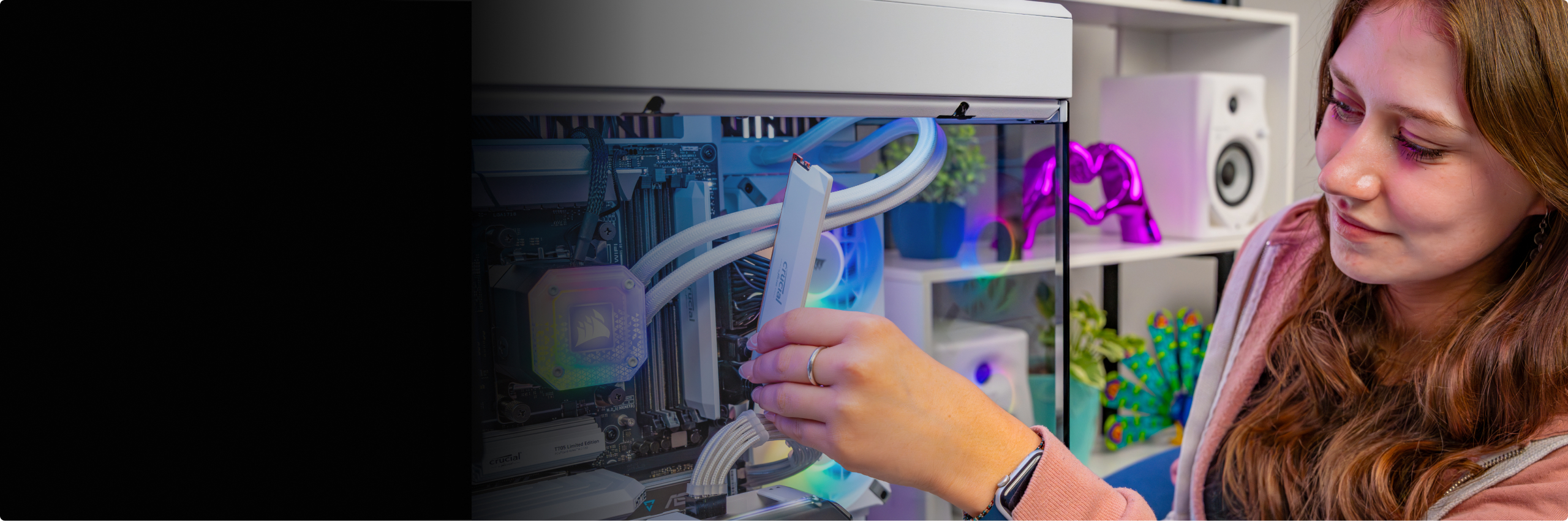 Laptop sitting next to a DJ turn table