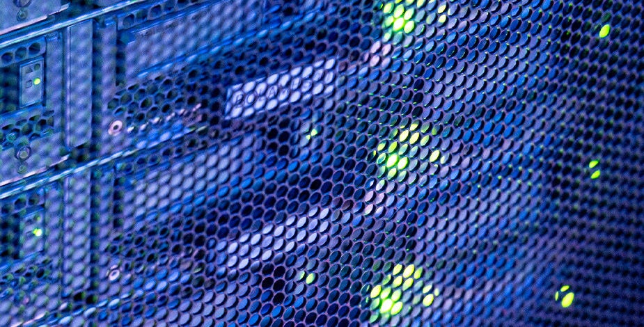 A close-up of a server rack in a data center.