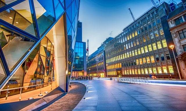 Walkway winding through moder office buildings