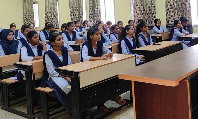 Class of students sitting at desks