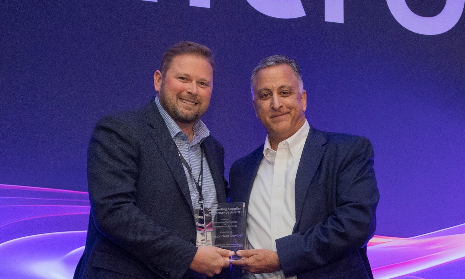 Anand Bahl presenting the award to Erik Loen