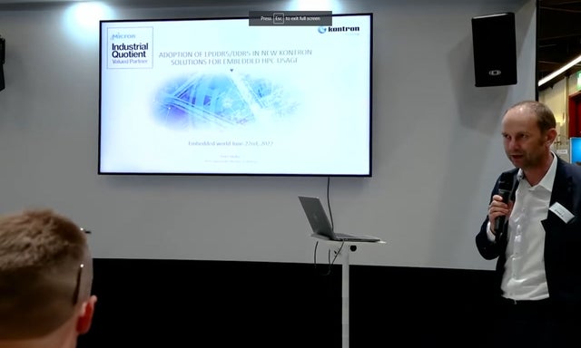 Man presenting in a conference room