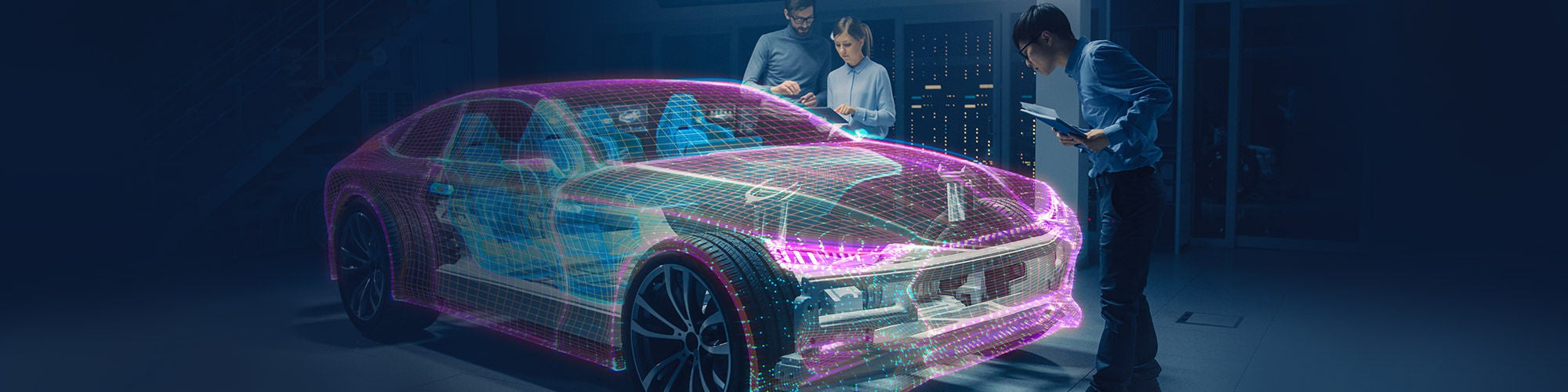 fusa-blog-header.jpg: three people examining a 3D image of a car