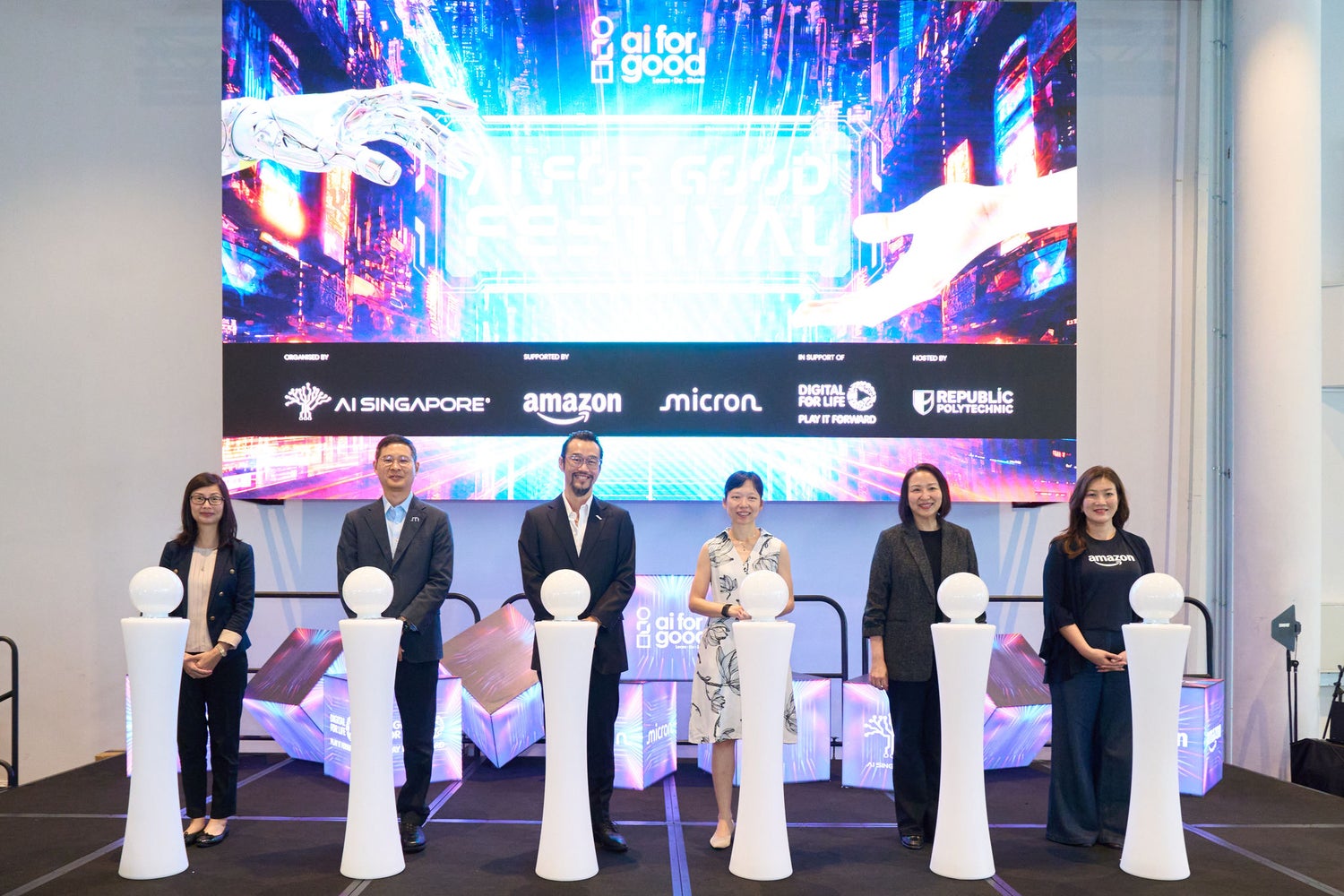 Representatives from industry and partner organizations participating in a technology initiative launch event.