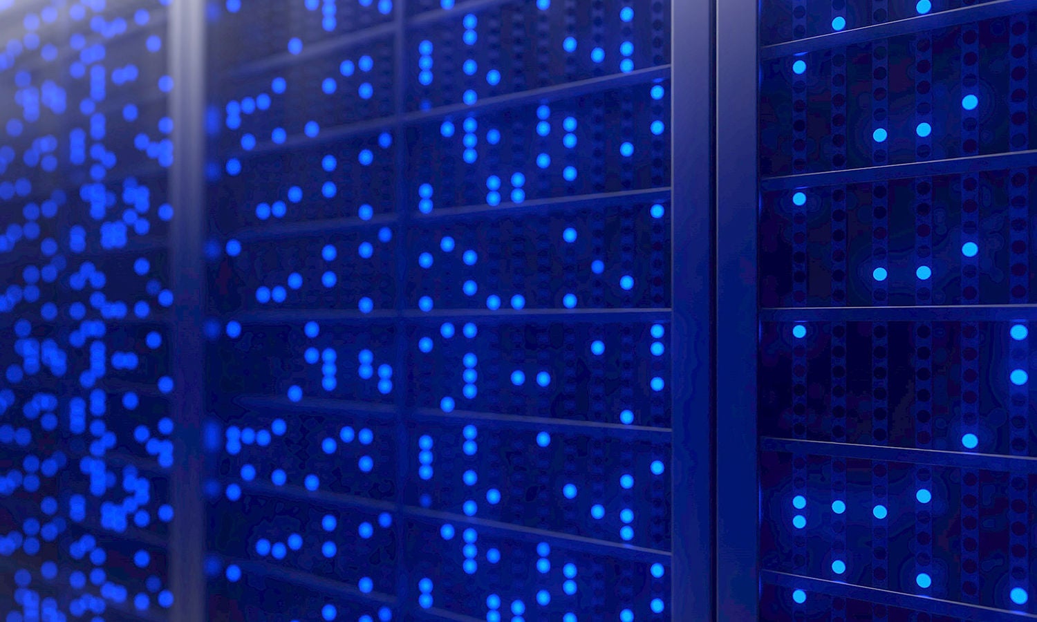 Blue lights on data servers in a dim room