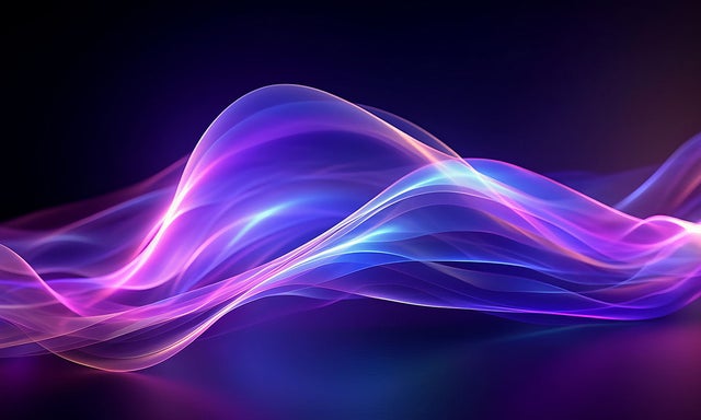 Waves of blue, purple and magenta transluscent colors on a black background
