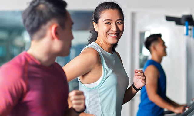 woman running on treadmill