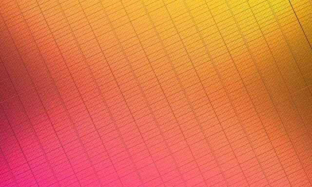 A close up of an orange and red wafer