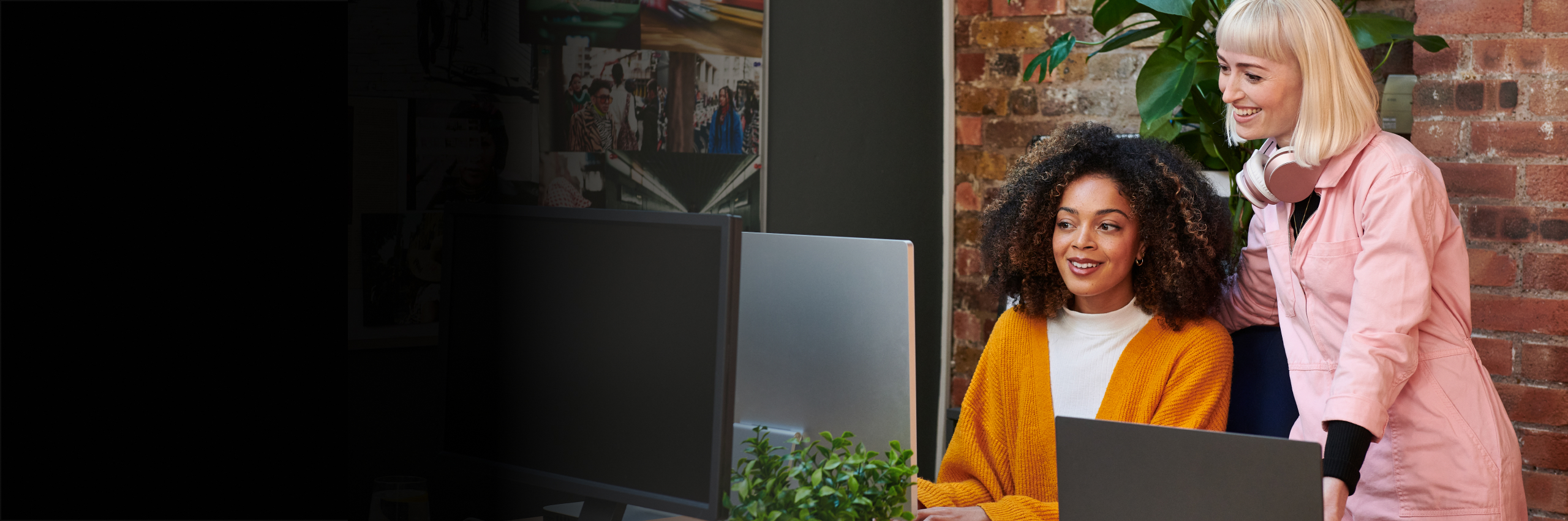 Two students looking at computer screens