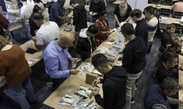 Micron Gives volunteers creating packets at an event