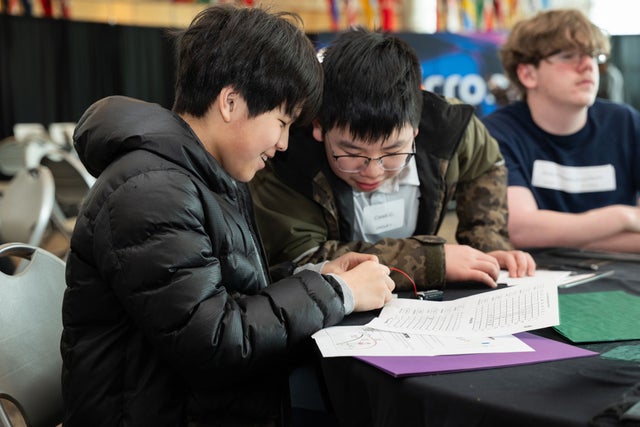 Students assembling at occ micron event