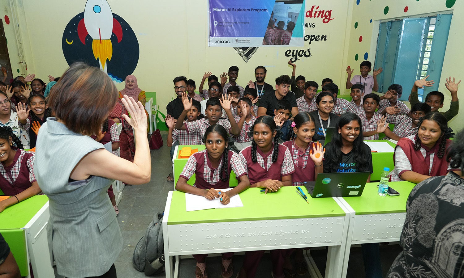 Students participating in a Micron-supported STEM workshop in a classroom setting.