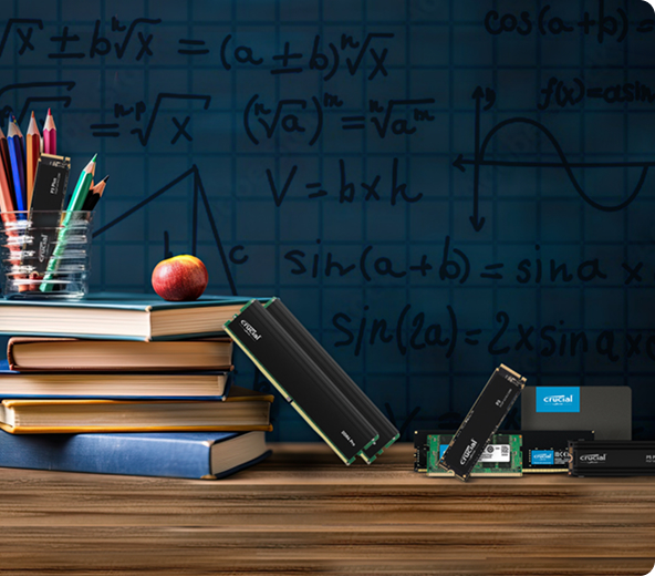 Various Crucial storage products.  INVMe M.2 SSDs SATA SSD mSATA SSD.  external SSDI arranged on a desk next to books. apples, and pens in front of a formula blackboard.  