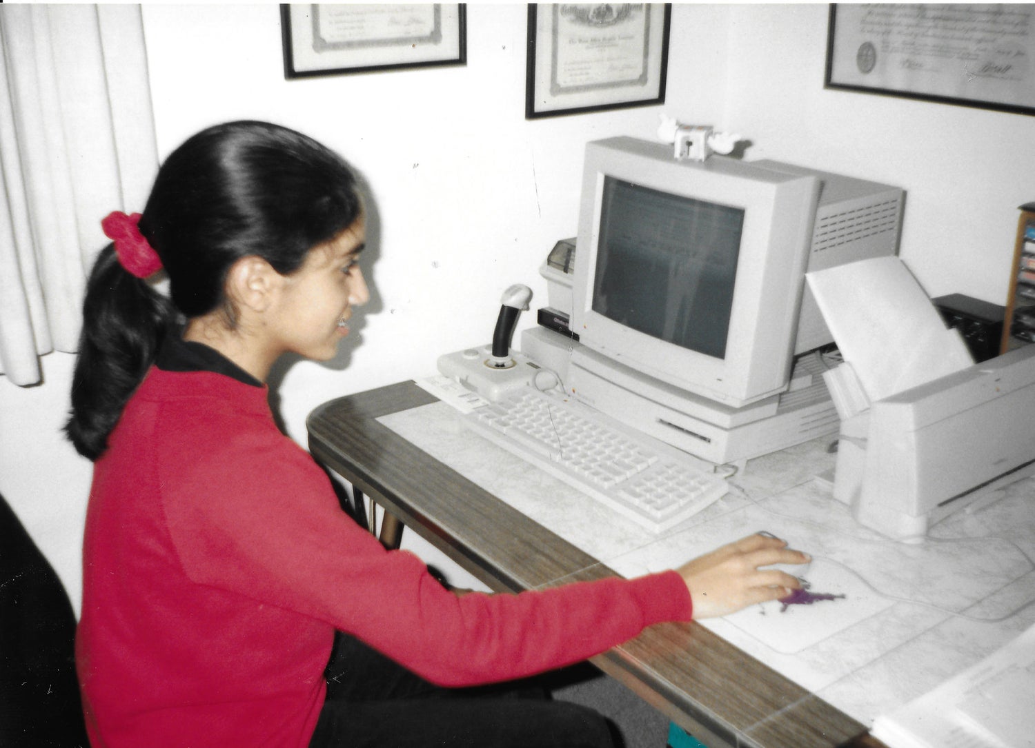 Sitting at computer working