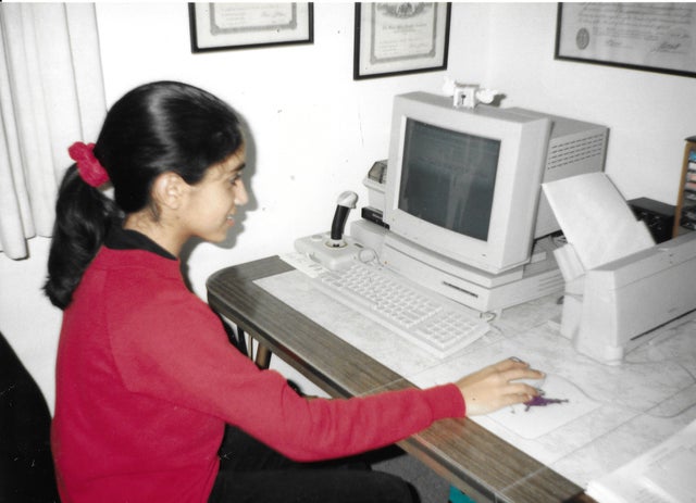Sitting at computer working