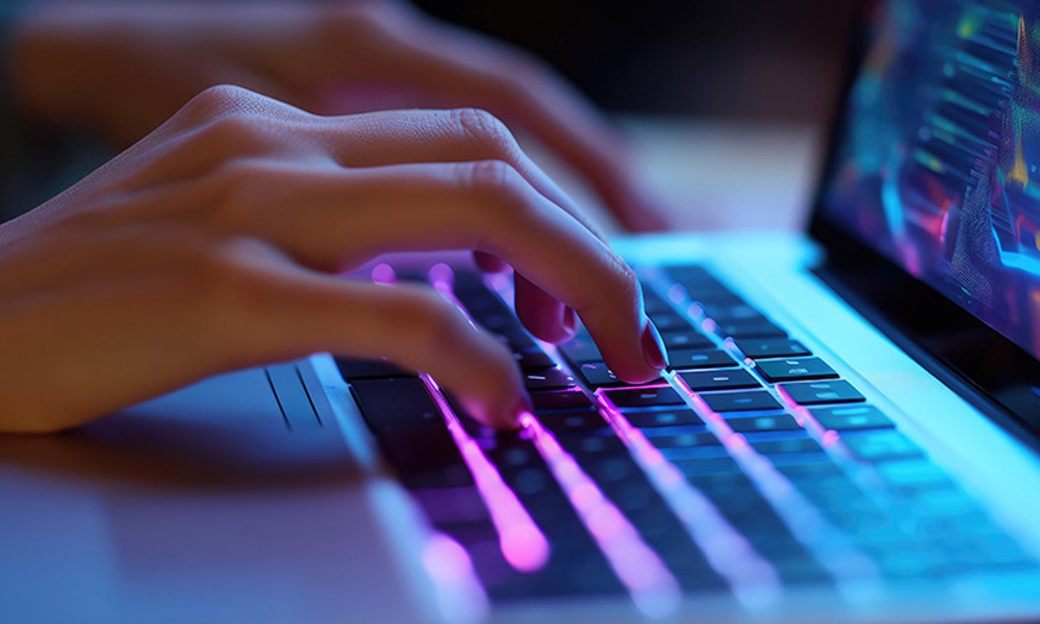 hands typing on keyboard