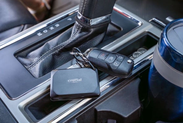 Image of Crucial SSD slot in a vehichle console.